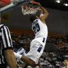 Dwayne Lathan goes for an alley oop reverse slam.