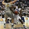 Myles Walker muscles up a low post field goal.