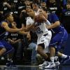 Dwayne Lathan is fouled fighting for a late game rebound.