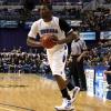 Myles Walker grips the ball for a pass.