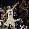 Lucas Eitel defends a Saluki jumper.