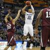 Dwayne Lathan scores on a long jumper.