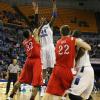 Myles Walker elevates and sinks a soft jump hook.