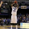 Carl Richard nails a long jumper.  Carl joined the 1,000 point club during the game.