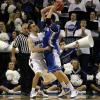 Jake Odum defends big Bluejay, Doug McDermott.