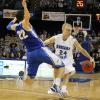 Avery Dingman soars backwards from Jordan Printy in a failed attempt to draw an offensive foul.