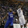 Myles Walker shoots over Gregory Echenique.