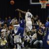 Myles Walker blocks Bluejay Josh Jones' layup.