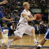 Lucas Eitel makes a pass from the lane.