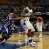 Myles Walker makes a low post move to the bucket.