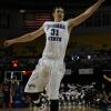 RJ Mahurin defends a Maryville baseline jump shot.