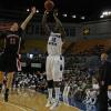 Carl Richard fires a long three pointer from the left wing.