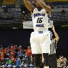 Tre Bennett sinks a three pointer.