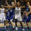 Racheal Mahan fights with Rachael Hackbarh for rebound position.