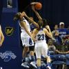 Racheal Mahan blocks a shot.