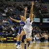 Deja Mattox does her best to pull in a long lob pass.