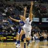 Deja Mattox does her best to pull in a long lob pass.