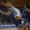 Britanny Schoen drives to the hoop, draws the foul, and goes to the line.