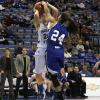 Brittnye McSparon blocks a Taylor Whitley shot.