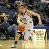 Natasha Zurek pushes the ball upcourt.