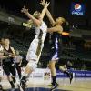 Kelsey Jacobs defends a Racheal Mahan post shot.