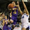 K.K. Armstrong goes hard to the rim.