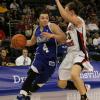 Kyndal Clark drives as Lady Redbird Jamie Russell defends.