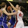 Marley Hall defends a driving Rachael Hackbarth.