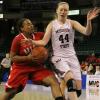 Shronda Butts goes to the rim as MSU's Lacey Boshe defends.