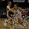 Jessica Valley gets her shoulder ahead of the defender as she drives for the bucket.