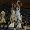 Deja Mattox shoots a running jump shot.