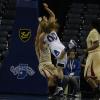 Natasha Zurek drives and draws a blocking foul.