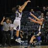 Anna Munn fires a baseline three pointer.