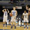 Taylor Whitley (center), Anna Munn (left), and Travecia Franklin (right) ... go ahead free throw.