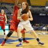 Marina Laramie works towards the basket.